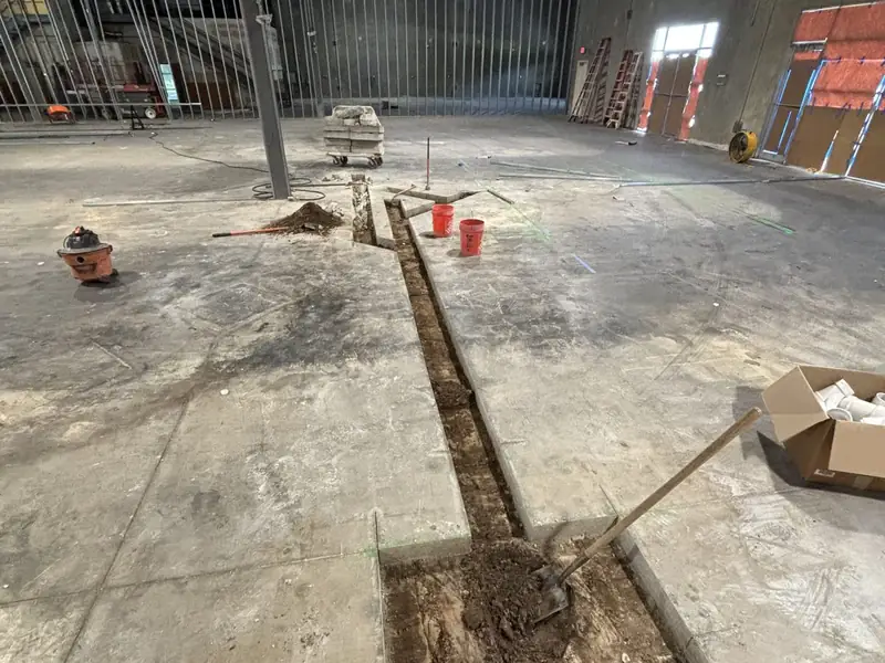 New floor drain trench in a commercial slab